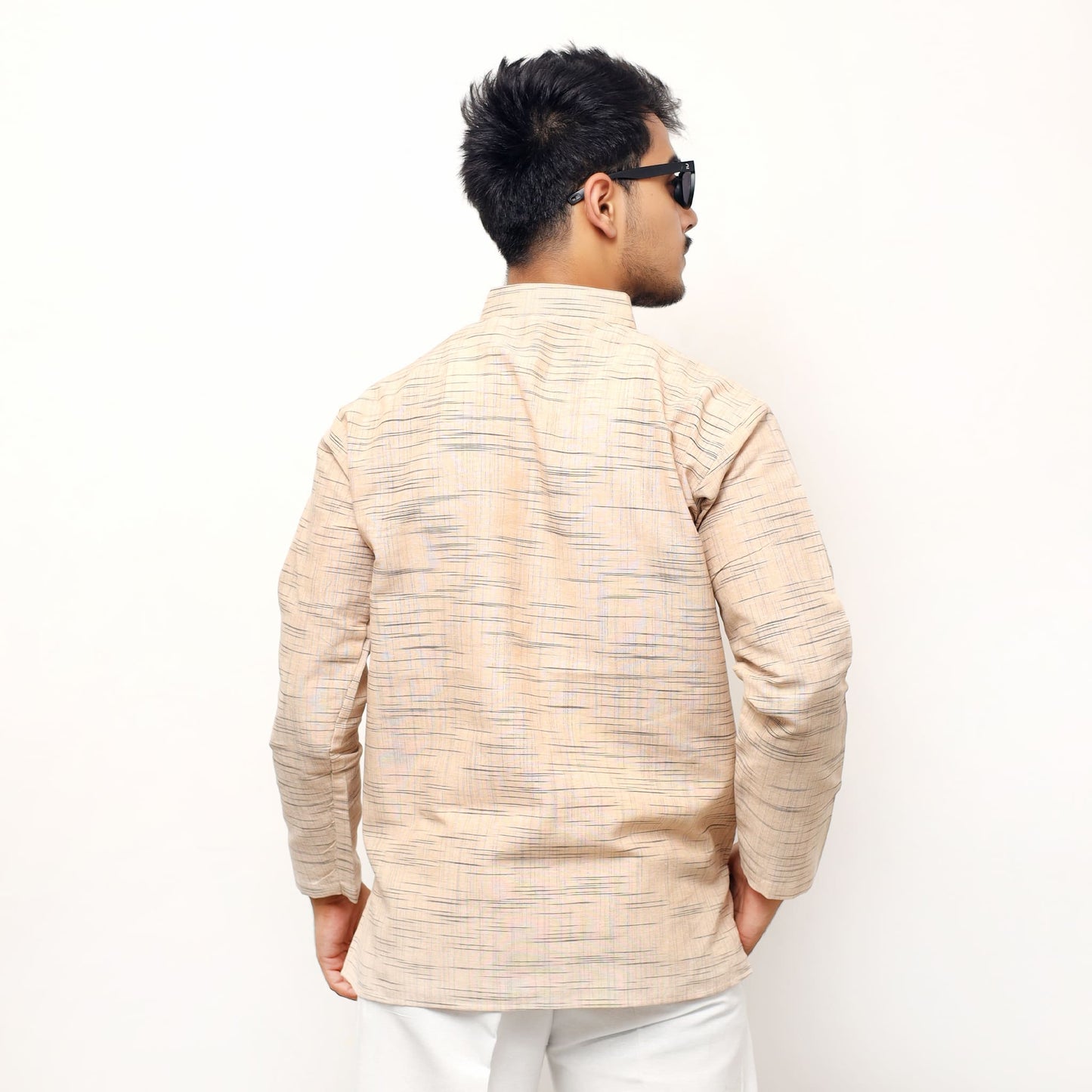 Back side view beige textured khadi cotton short kurta for men