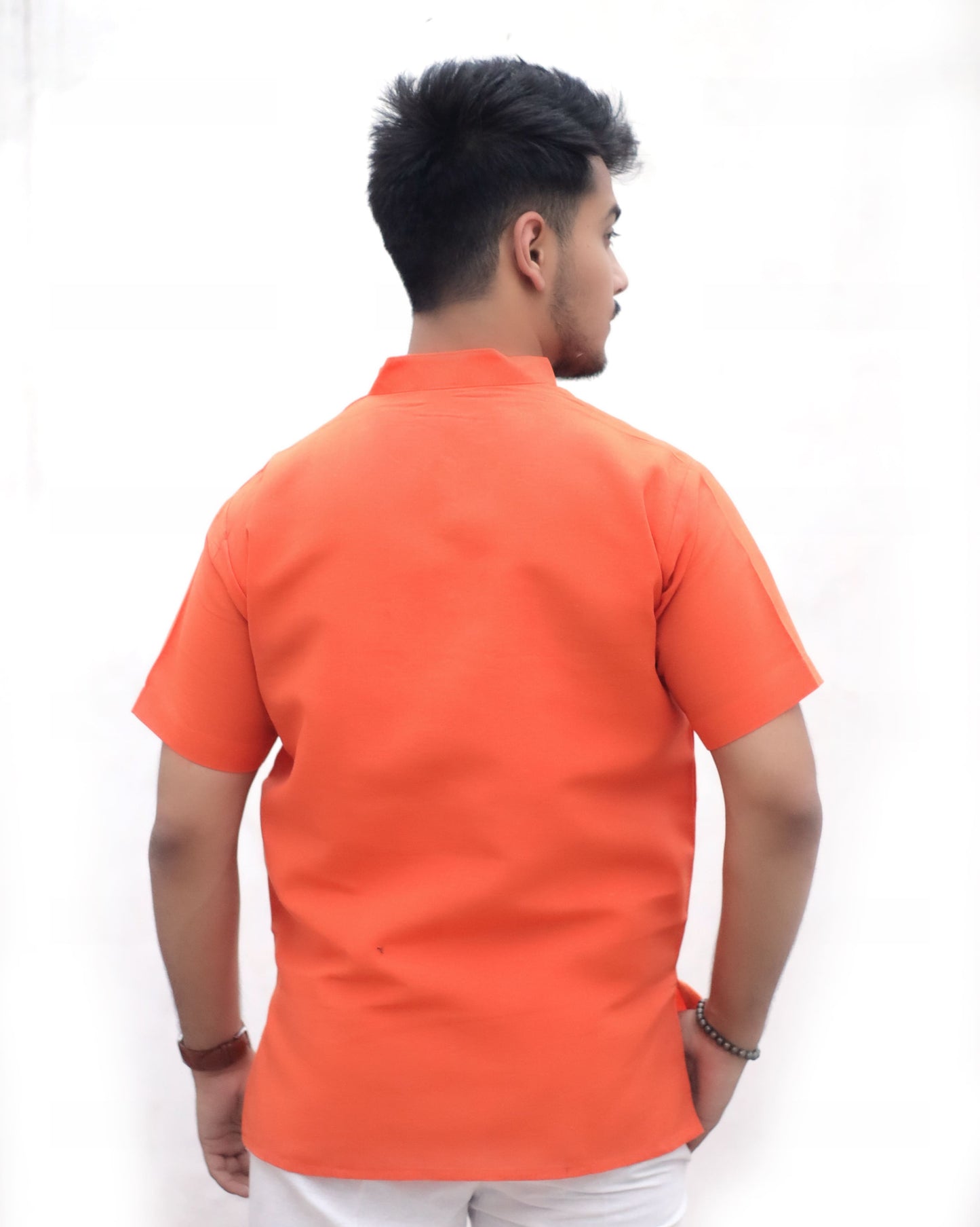 Back view orange half sleeves khadi cotton short kurta