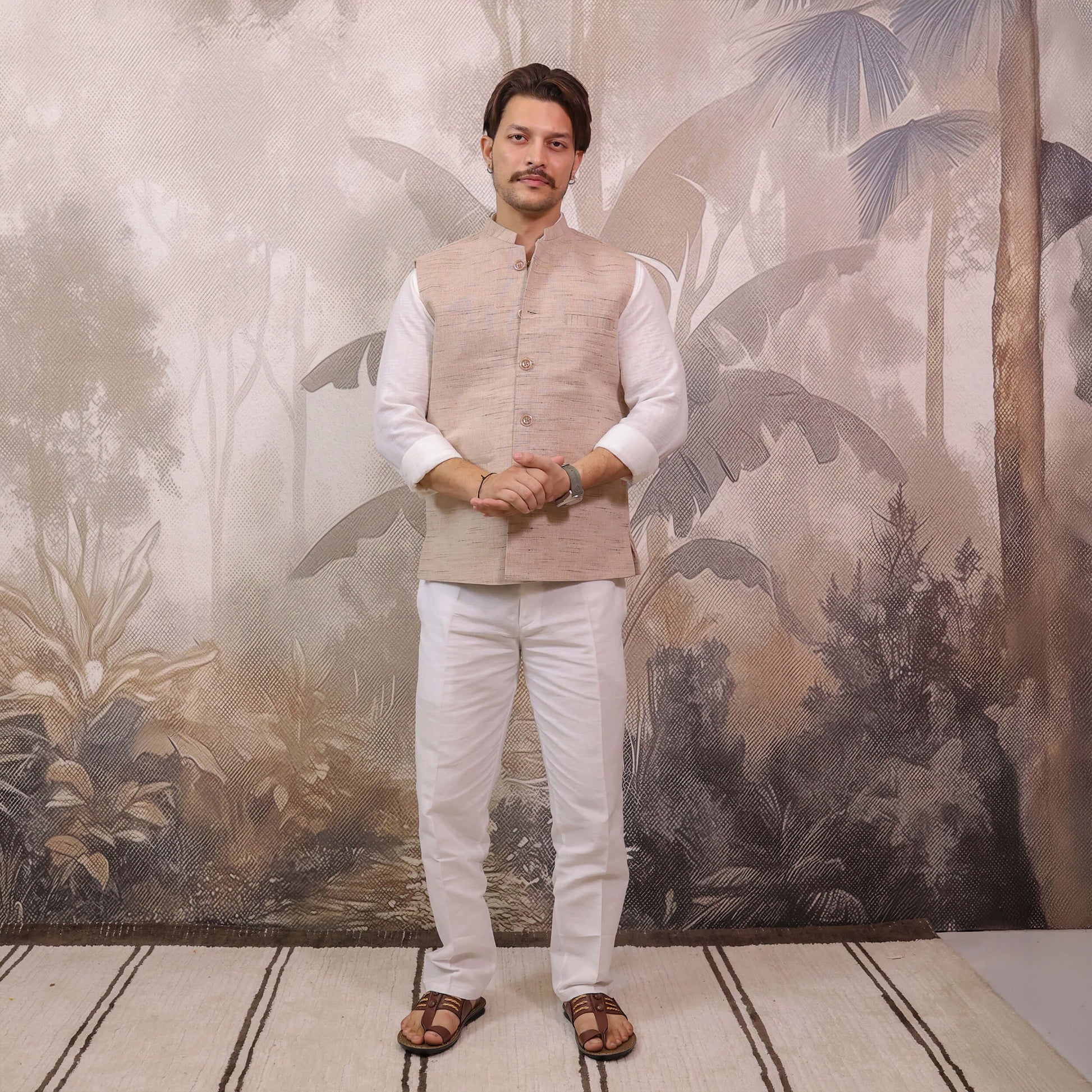 Full-length view of Skin Tone Cotton Bhagalpur Nehru Jacket for Men styled with a white kurta and pajama.