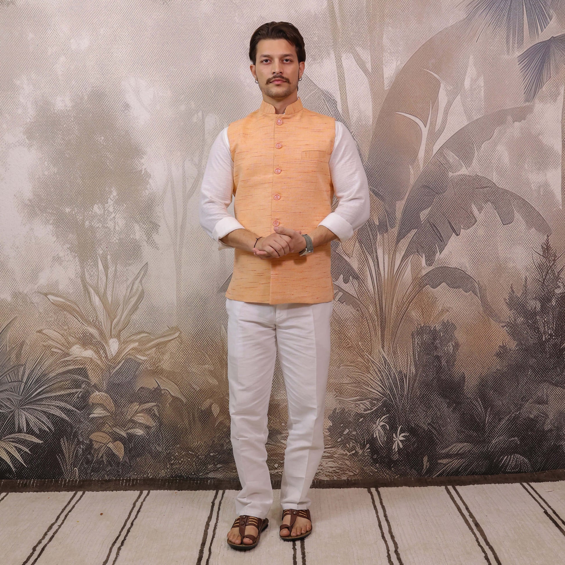 Front view of Orange Handloom Cotton Bhagalpur Nehru Jacket for Men paired with a white kurta and pajama.