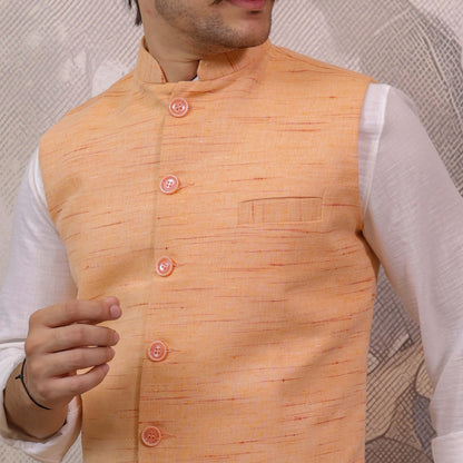 Close-up of Orange Handloom Cotton Bhagalpur Nehru Jacket for Men showcasing the handloom texture and button detailing.