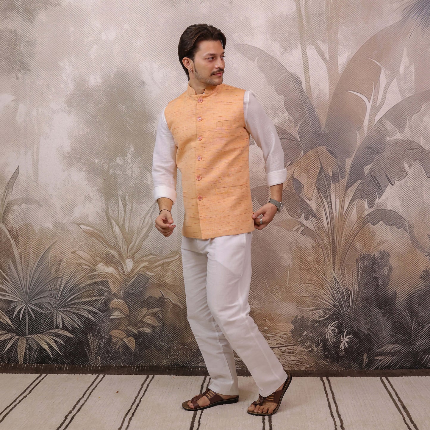 Model wearing Orange Handloom Cotton Bhagalpur Modi Jacket for Men styled for festive and traditional occasions.