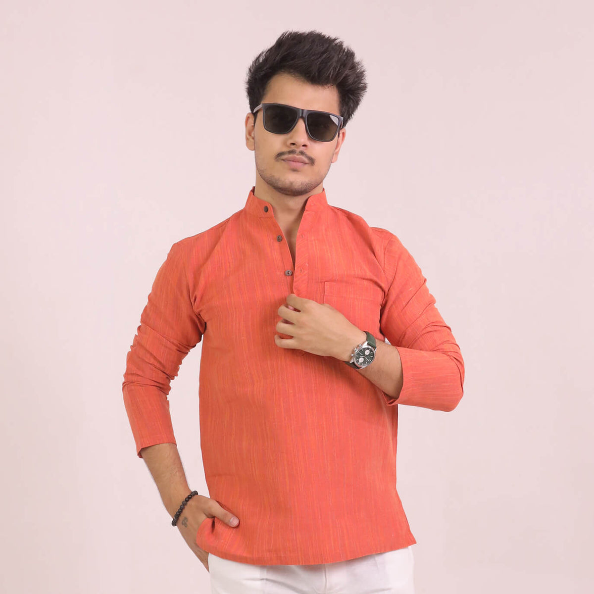 Front view of men wearing Orange Thread Lines Full Sleeves Cotton Short Kurta