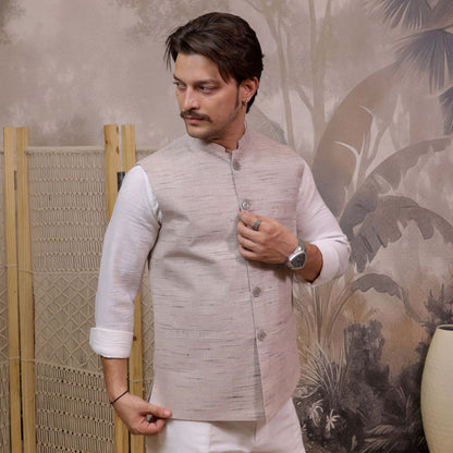 Model wearing Grey Handloom Cotton Bhagalpur Modi Jacket for Men | Kargham for a festive ethnic look.