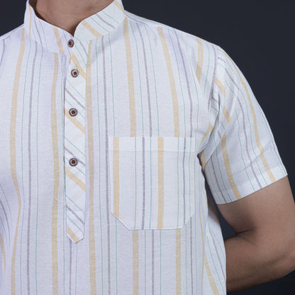 Close-up white khadi kurta with yellow stripe pattern and pocket detail