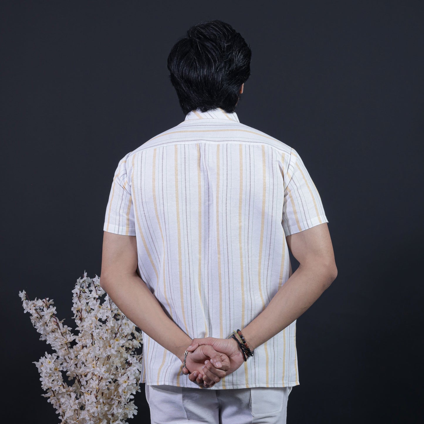 Back view white base striped khadi kurta with yellow lines