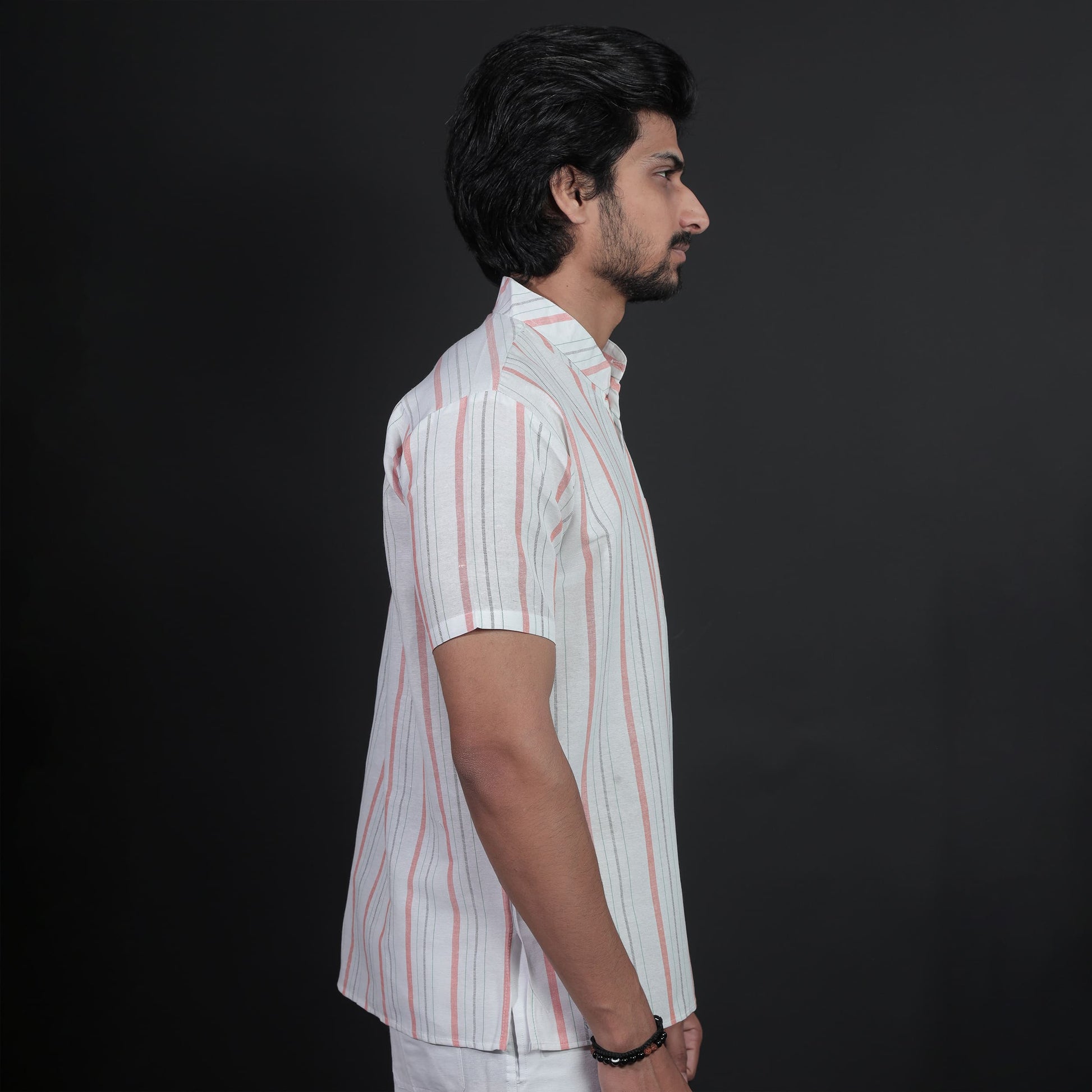 Side view of white and orange striped short kurta for men