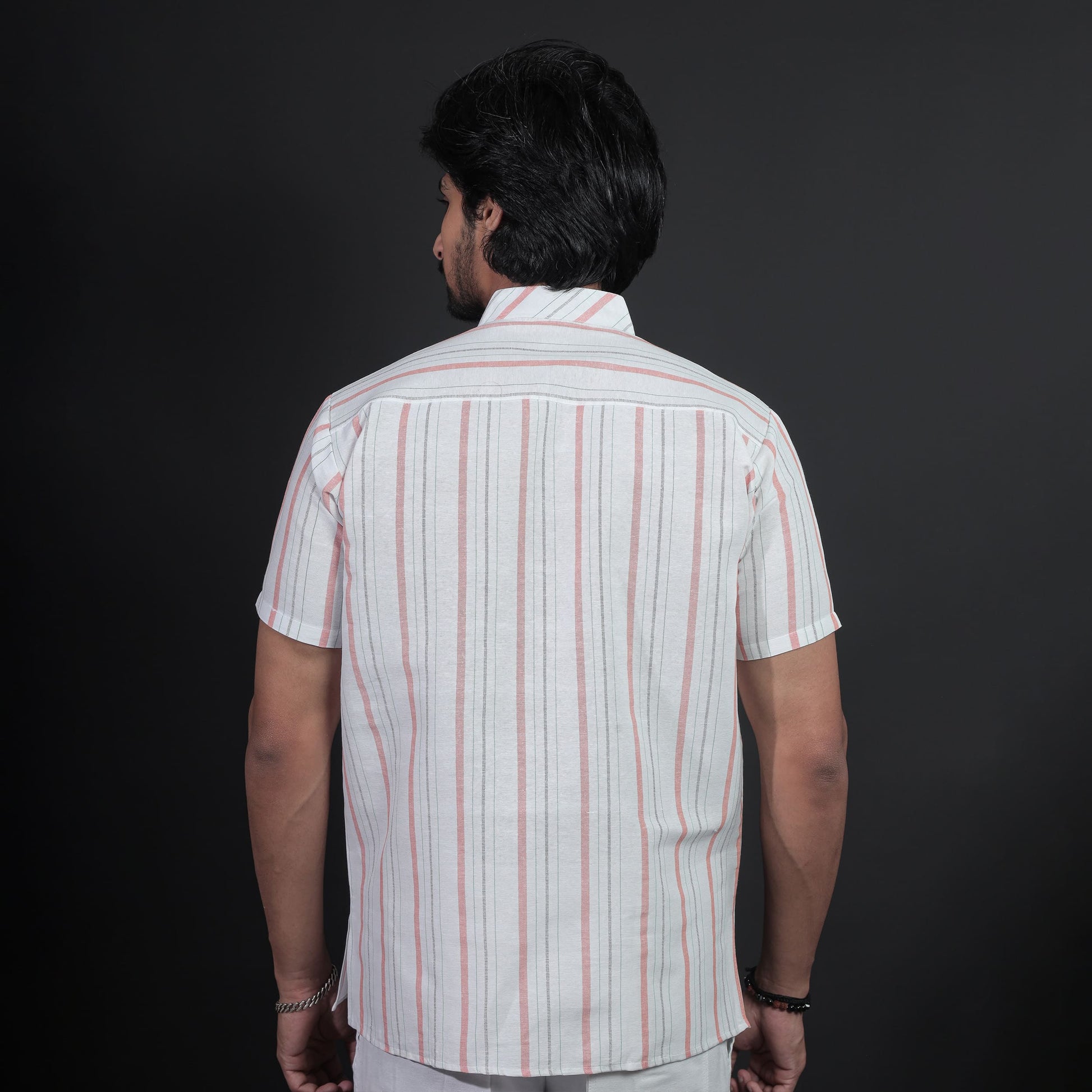Back view white base kurta with vertical orange stripes