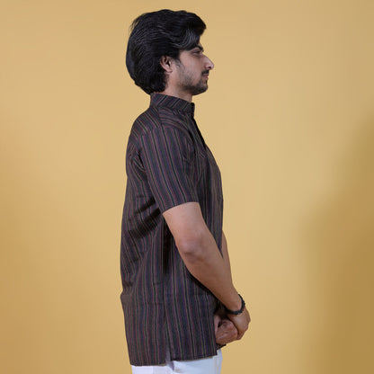 Side profile of black striped short kurta half sleeves minimal design