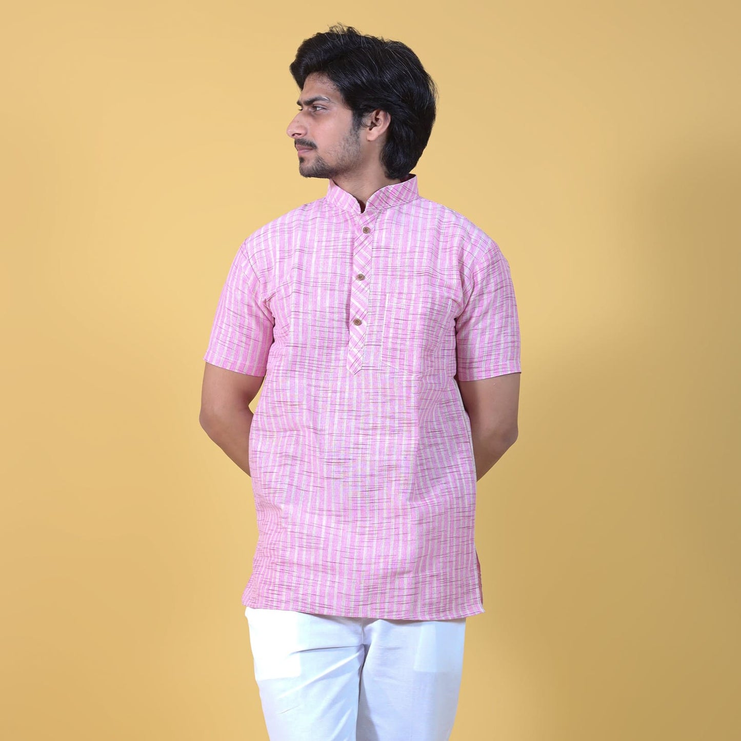 pink khadi cotton short kurta for men with golden stripes front view