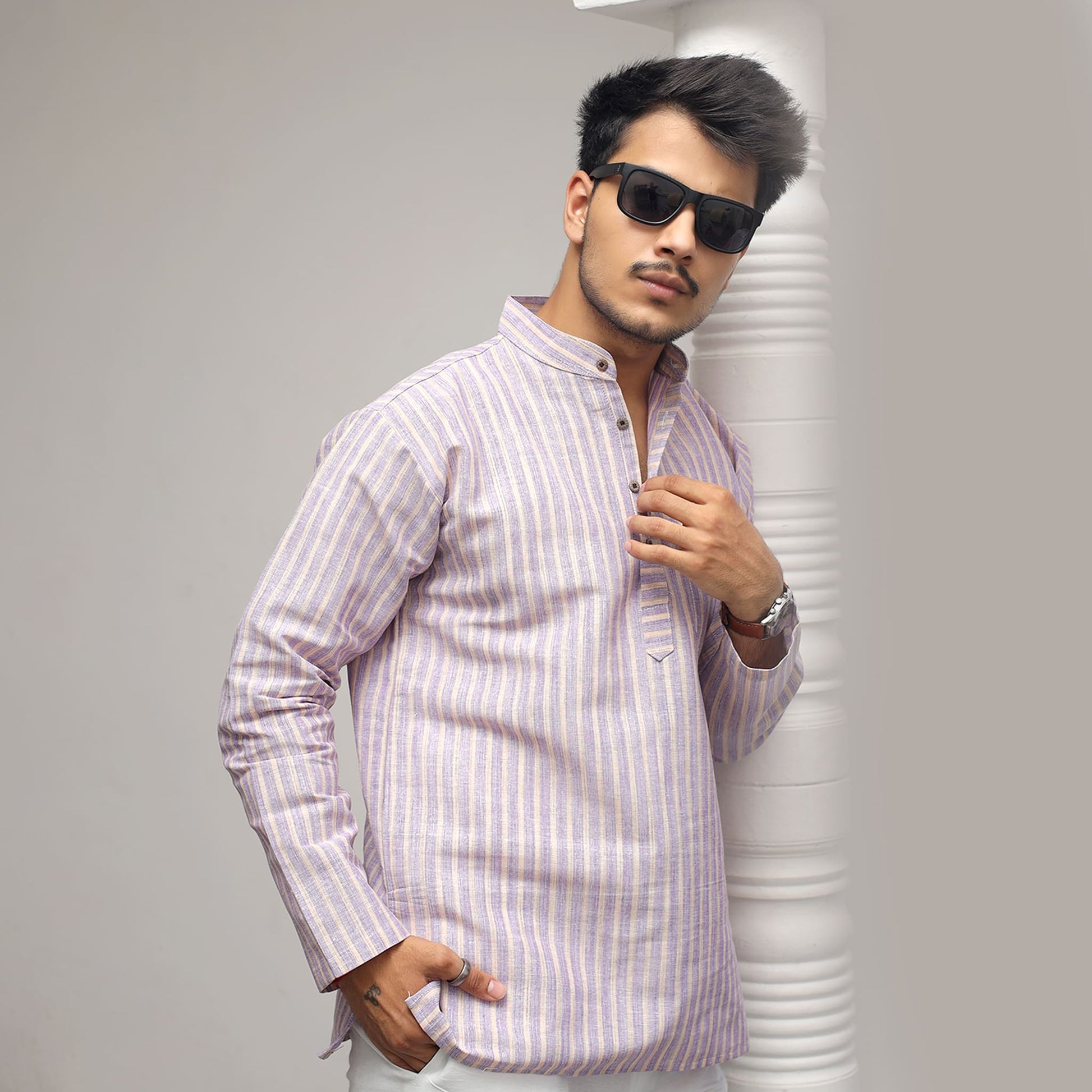 Purple striped khadi kurta styling look with pillar background