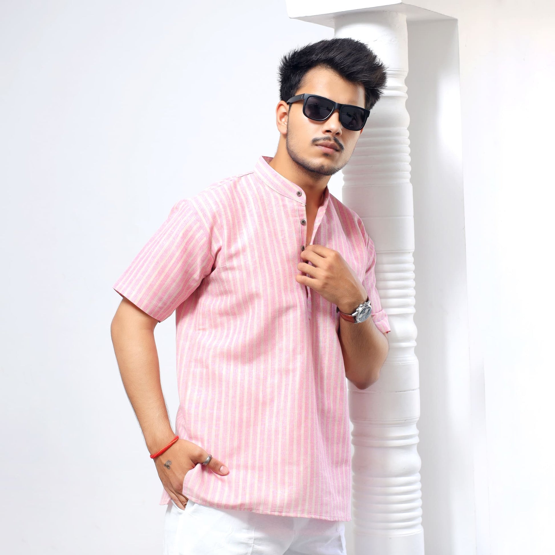 Pink striped khadi short kurta styled casually with modern fit