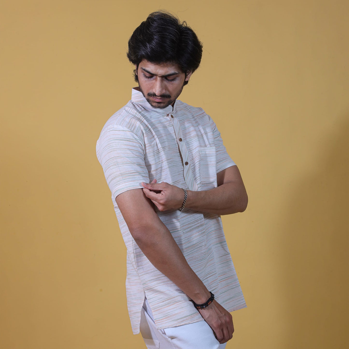 side profile white khadi kurta green jharna half sleeves