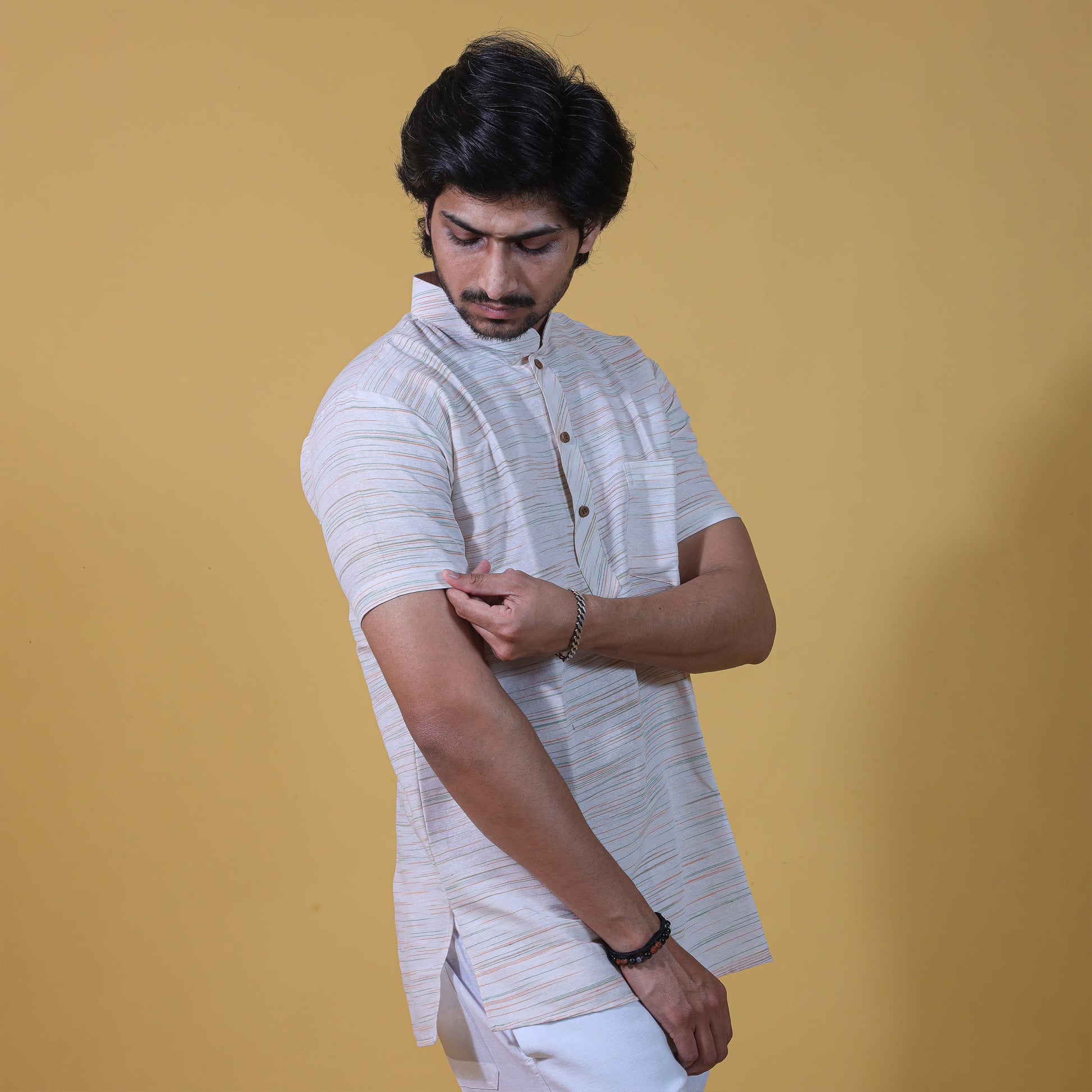 side profile white khadi kurta green jharna half sleeves
