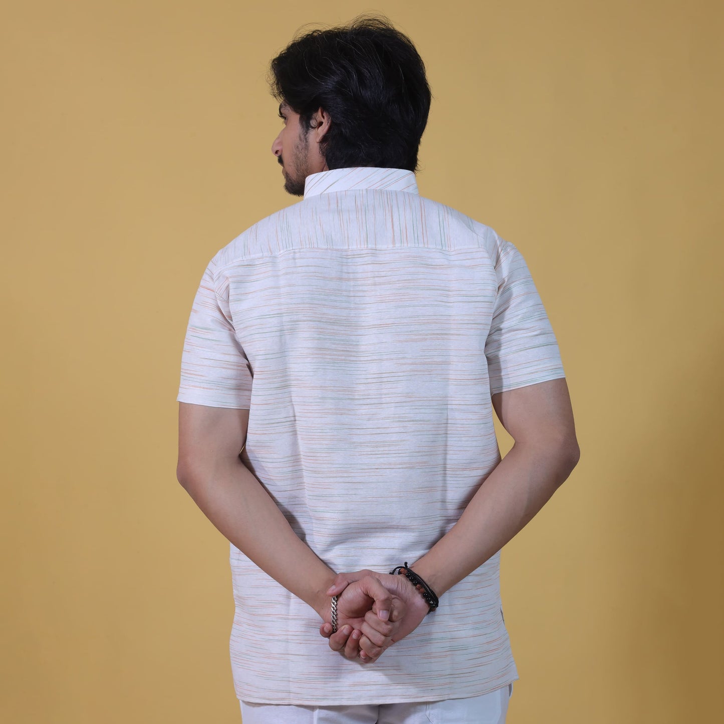 back view white base kurta with green jharna pattern
