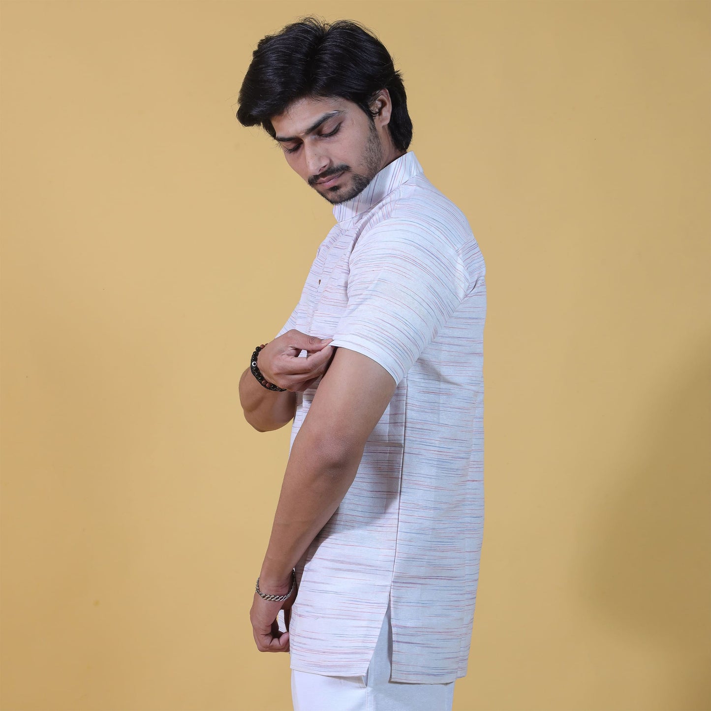 side profile white kurta with orange jharna half sleeves