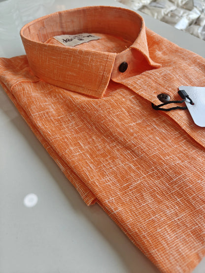 Orange linen-blend half sleeve shirt with chest pocket and dark buttons