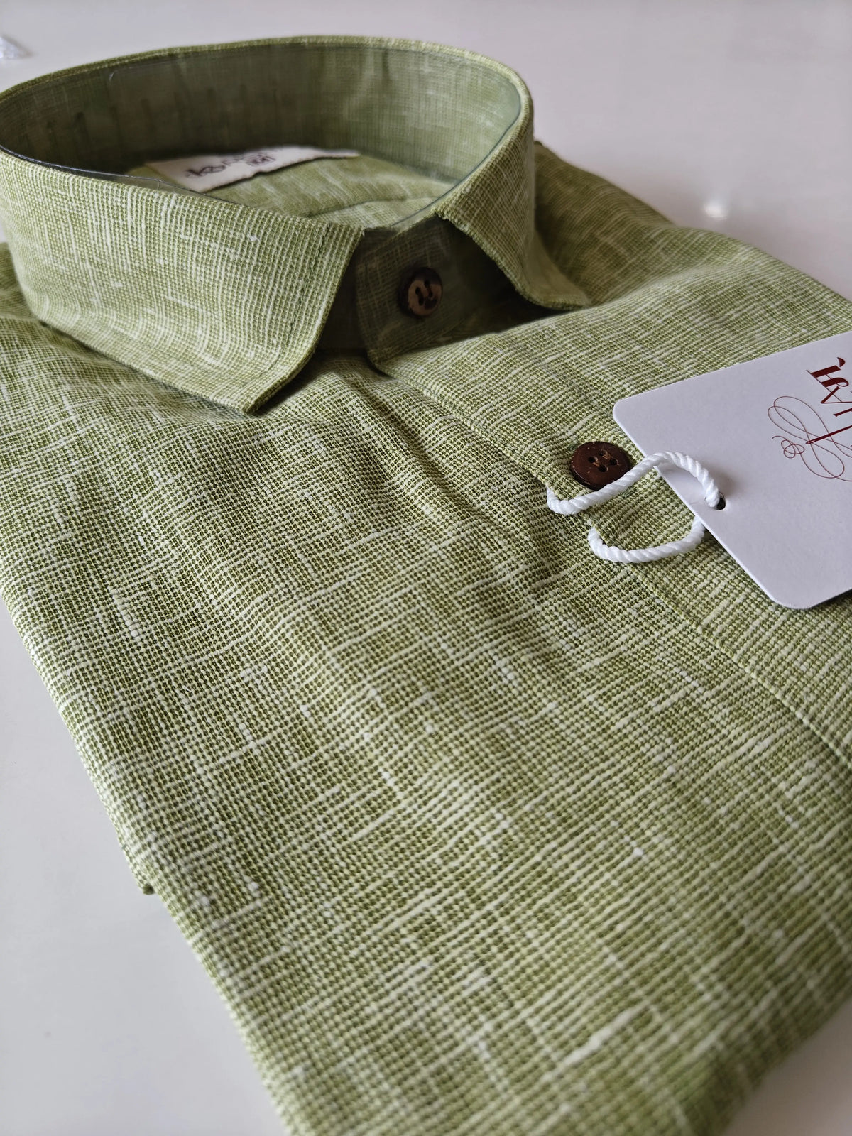 Mint green linen blend shirt collar and textured fabric detail