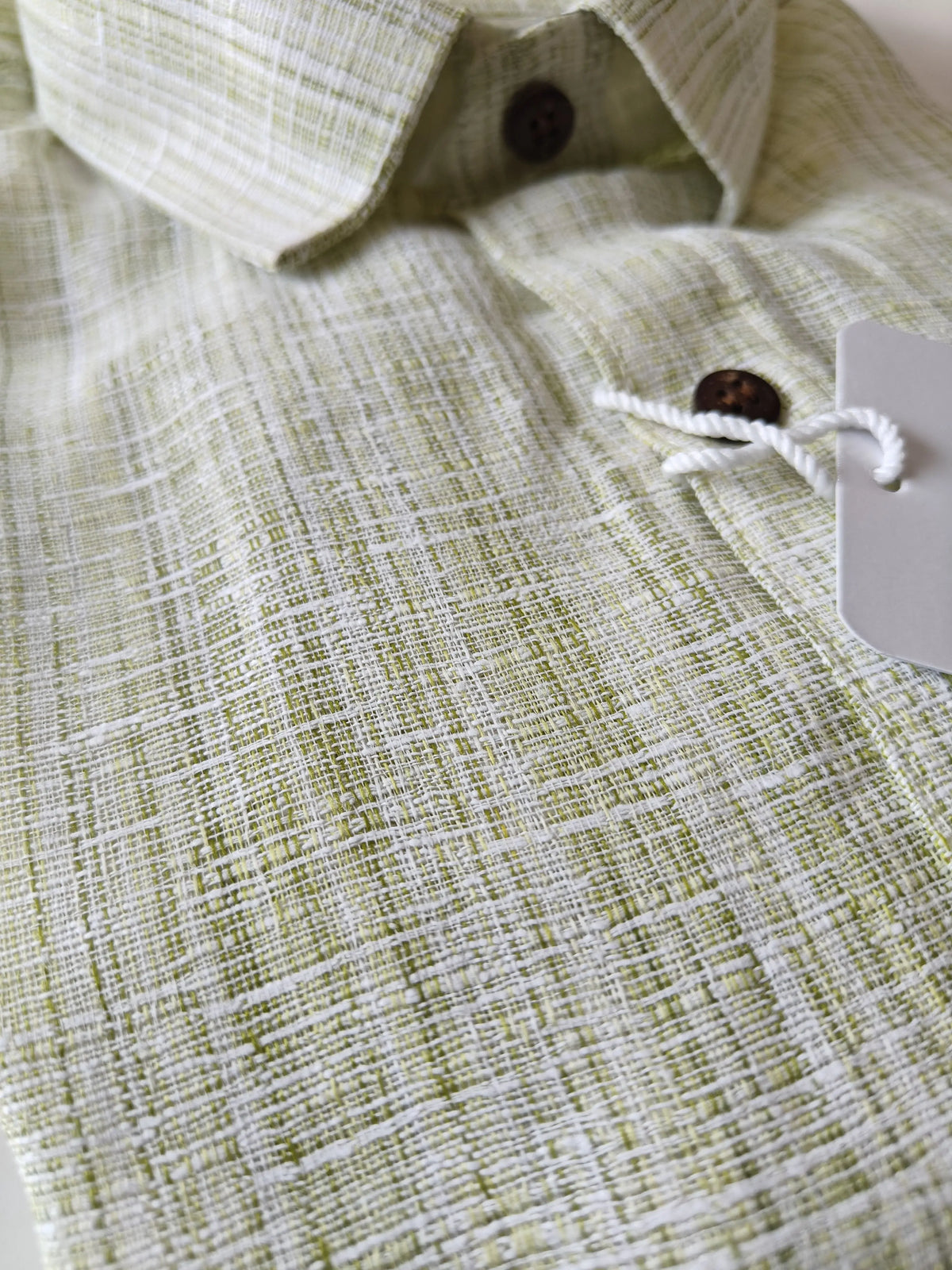 Green handloom cotton shirt fabric texture and collar detail