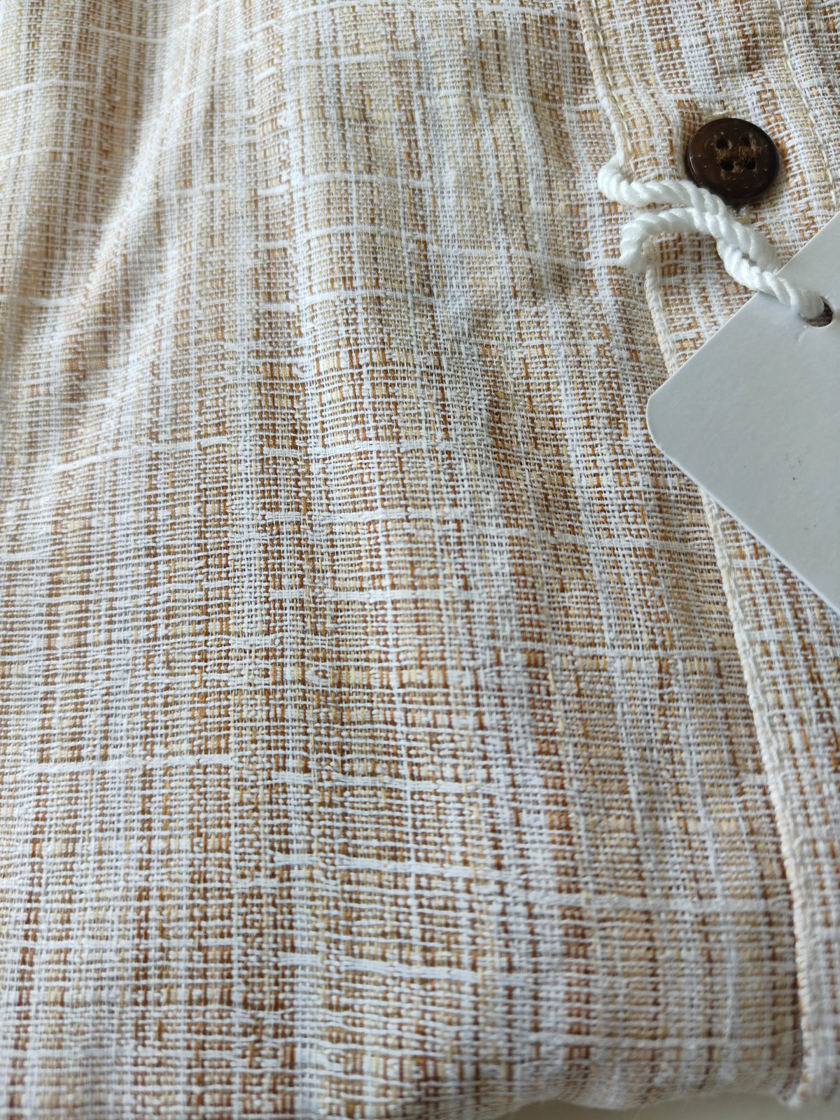 Rustic textured handloom cotton fabric of beige men's half sleeve shirt