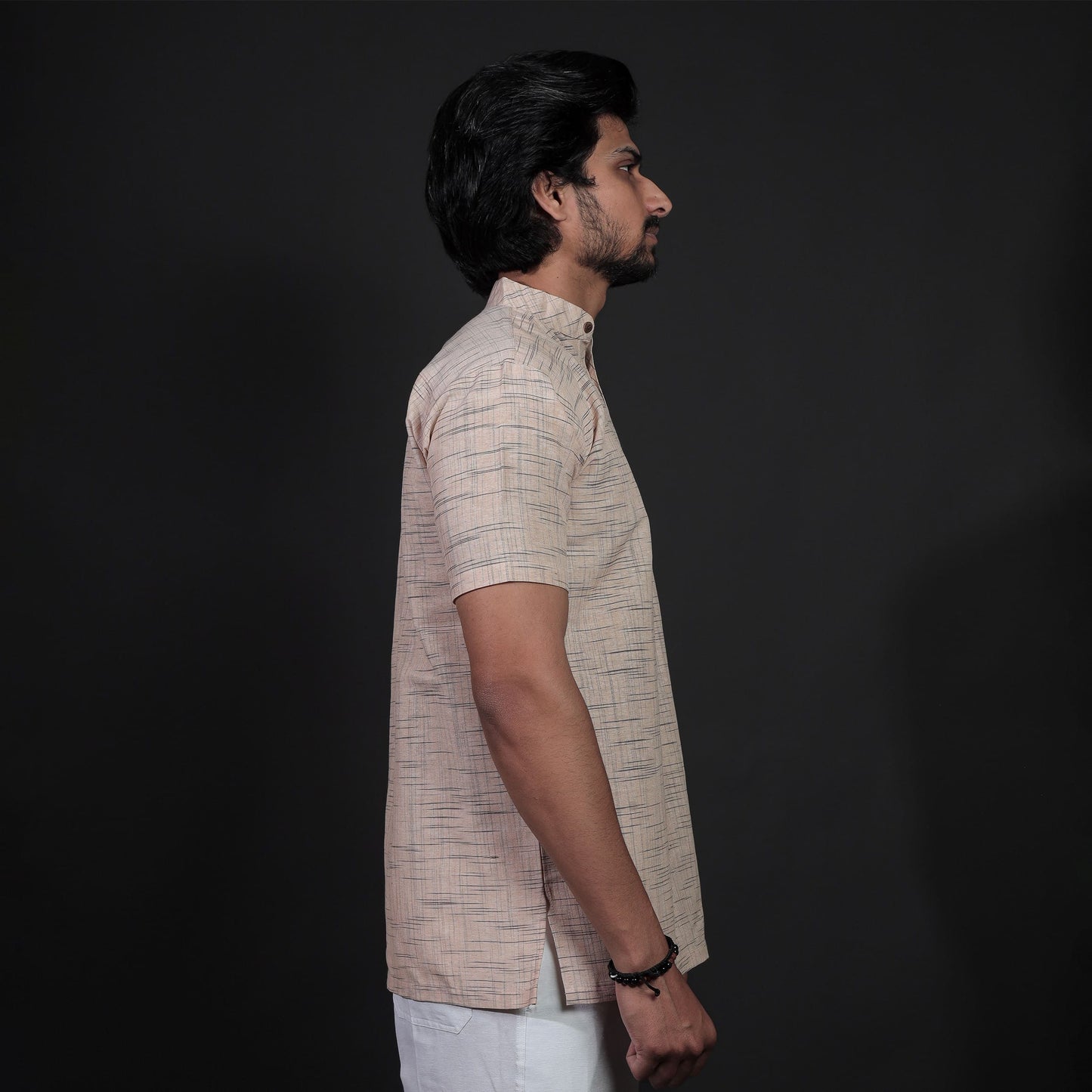 Side Profile of Beige Half Sleeves Khadi Cotton Kurta with White Pant