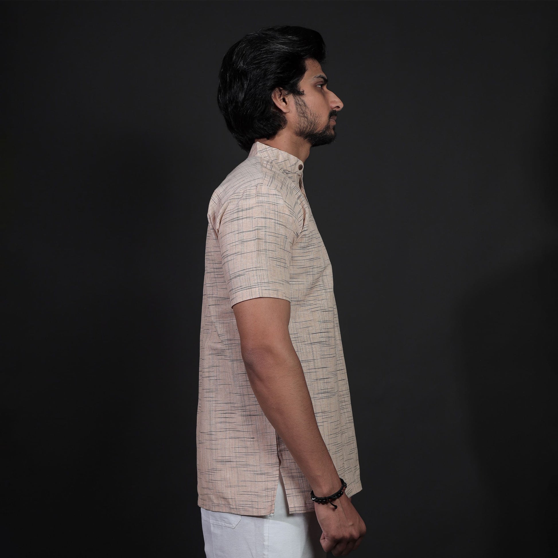 Side Profile of Beige Half Sleeves Khadi Cotton Kurta with White Pant