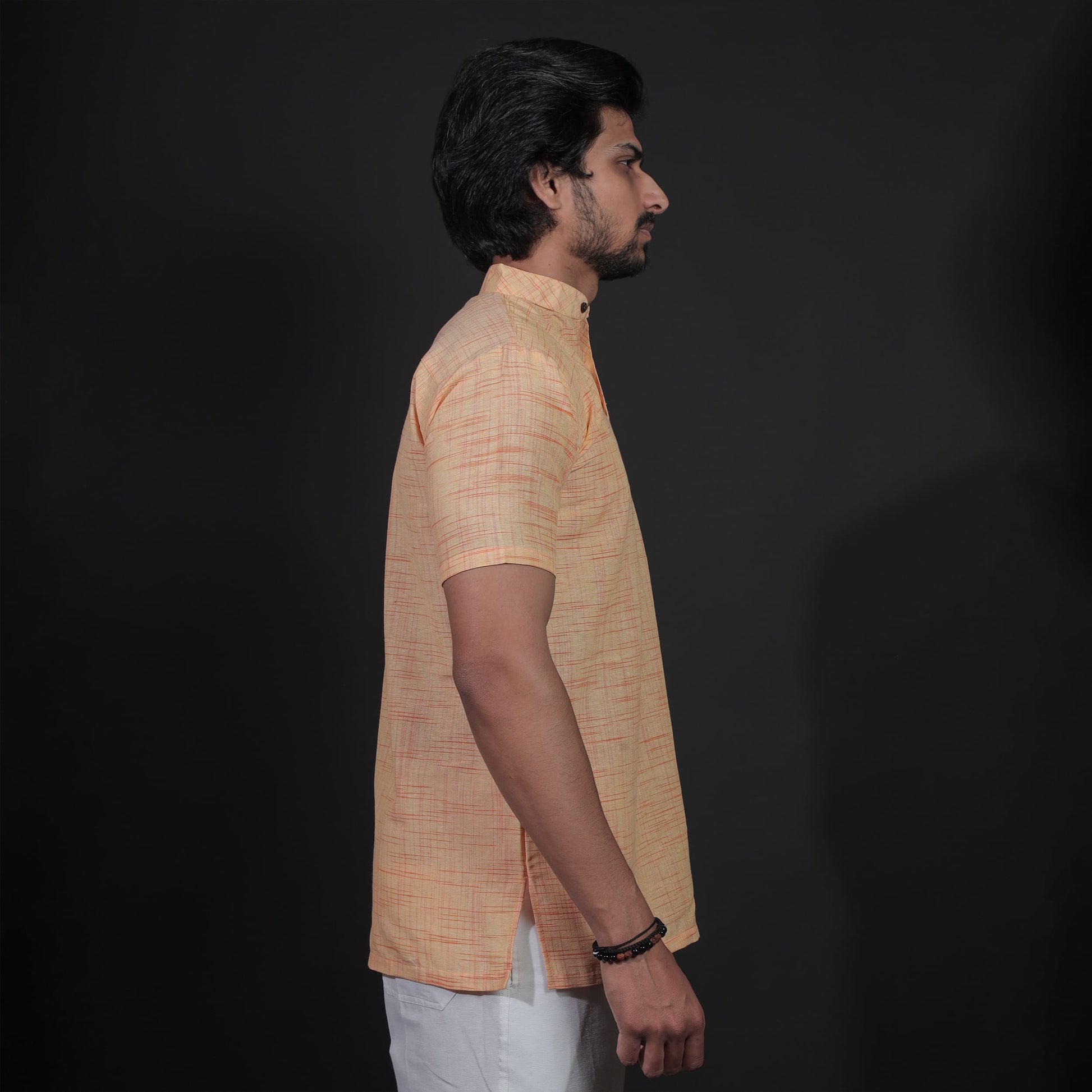 Side View of Yellow Half Sleeves Short Kurta for Men