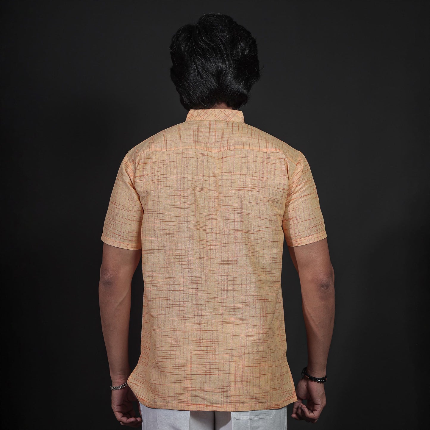 Back Design of Men’s Yellow Kurta with White Pant