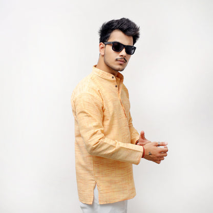 Yellow textured full sleeves khadi cotton short kurta side pose for men