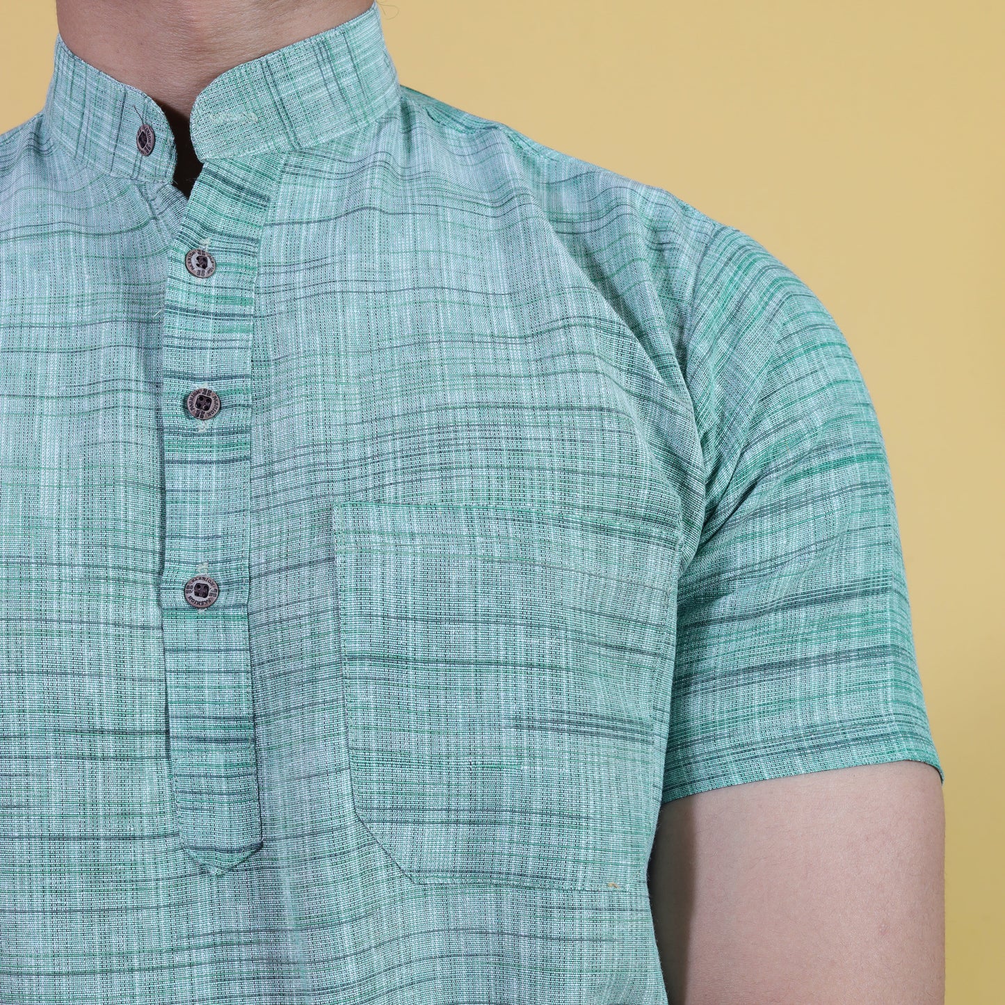 Close-up of Green Light Jharna khadi cotton kurta texture and mandarin collar