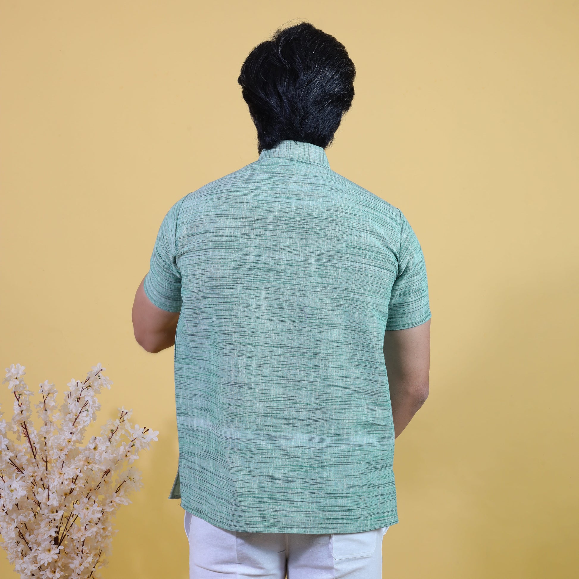 Back view of Green Light Jharna half sleeves khadi cotton kurta pant set