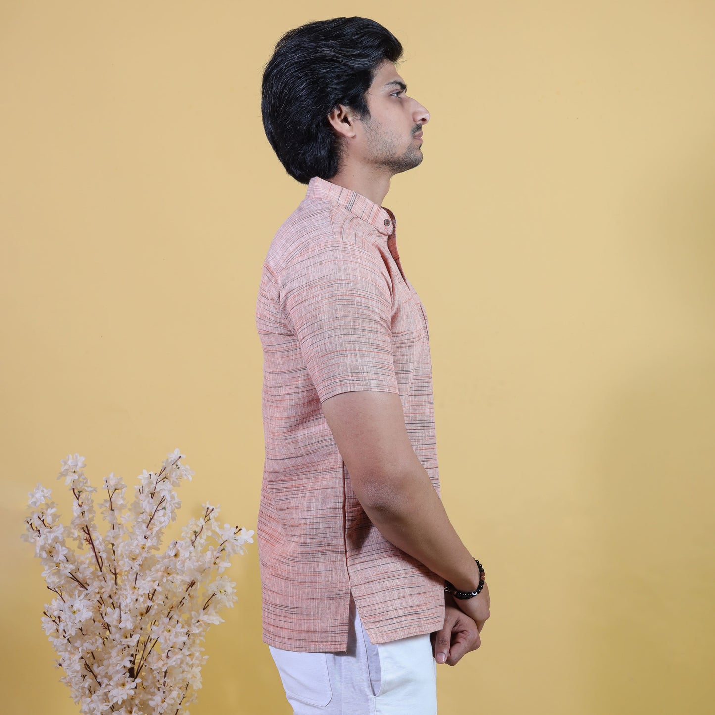 Side view of Orange Light Jharna khad kurta short kurta for men