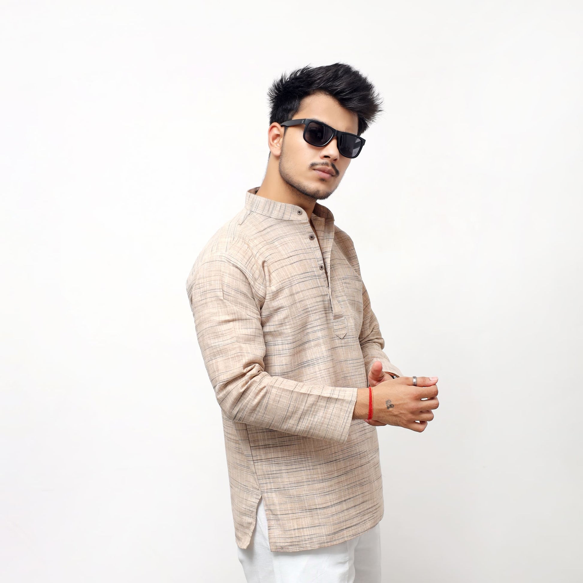 Side pose beige khadi cotton Light Jharna short kurta for men