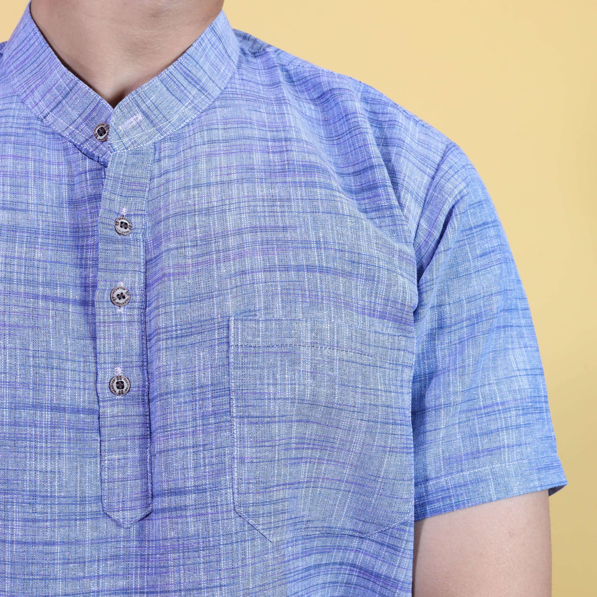 Close-up texture of blue Jharna khadi kurta fabric detail