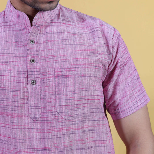 Close-up pink khadi kurta fabric with textured Jharna weave