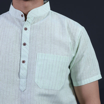 Close-up of green loomstripe half sleeves khadi kurta with mandarin collar and pocket detailing