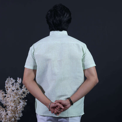 Back view of green loomstripe handwoven-inspired short kurta for men