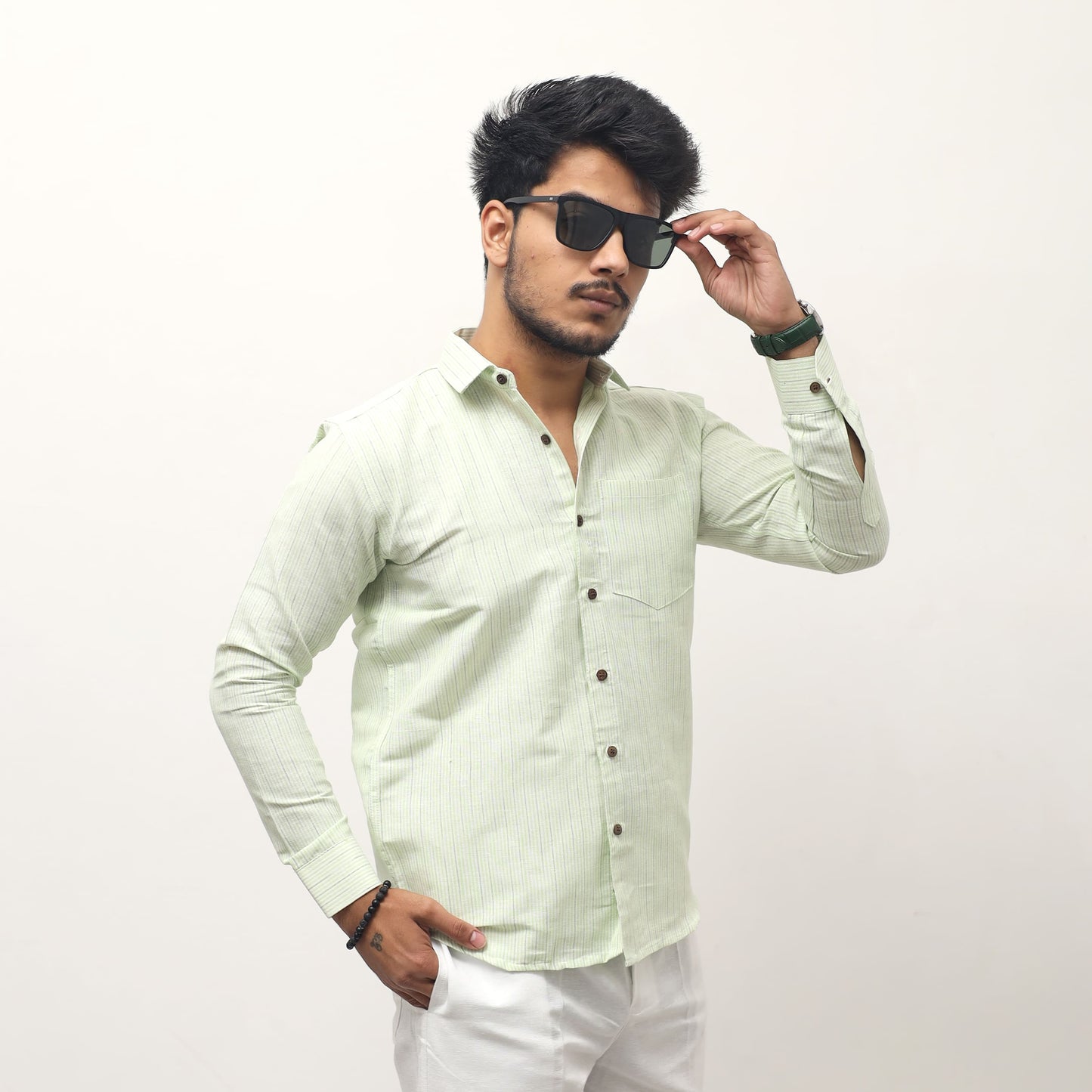 men wearing green khadi cotton shirt loom stripe full sleeves front angle