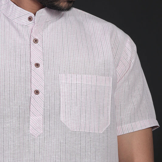 Close-up of pink LoomStripe kurta fabric with mandarin collar