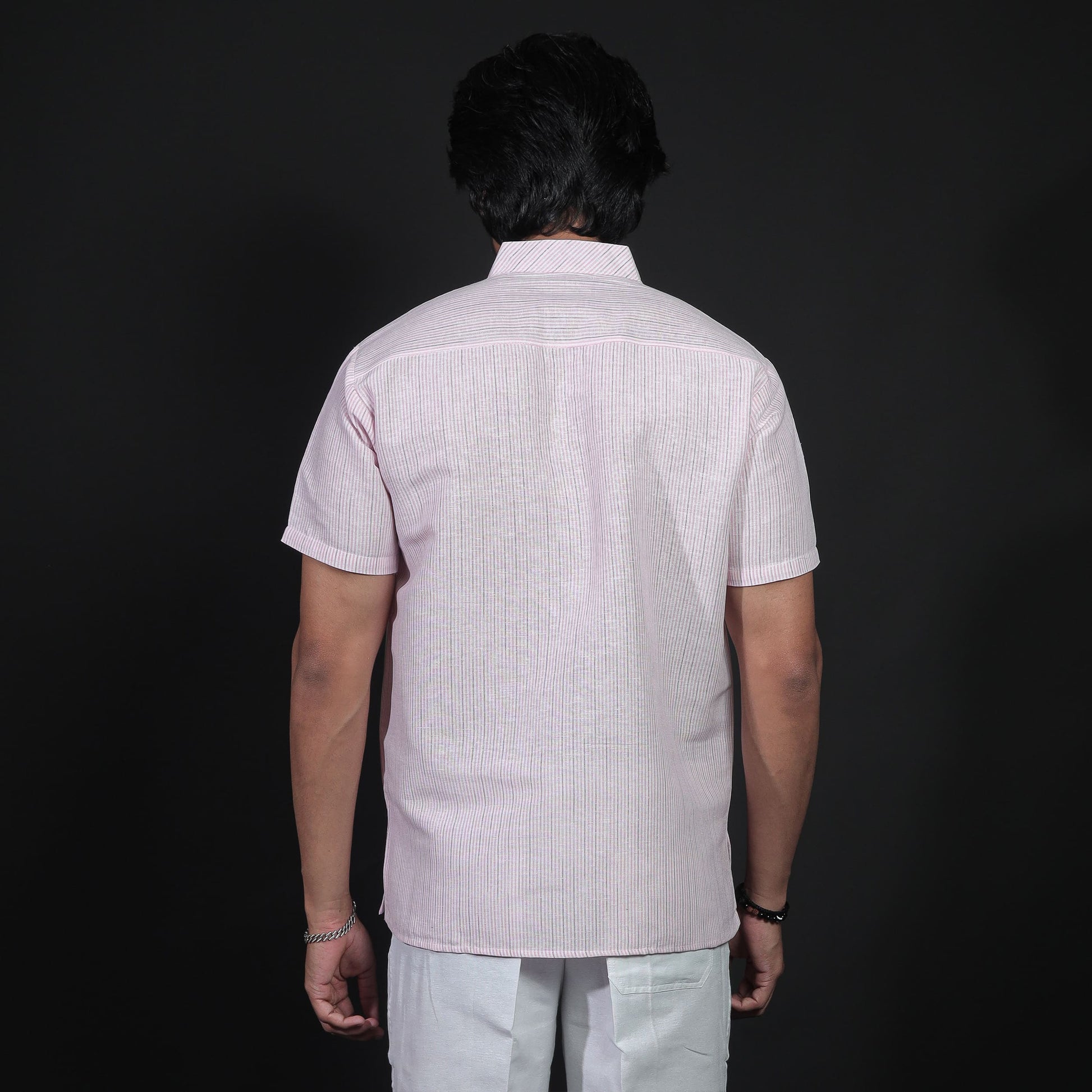 Back view of pink LoomStripe kurta showing stripe pattern