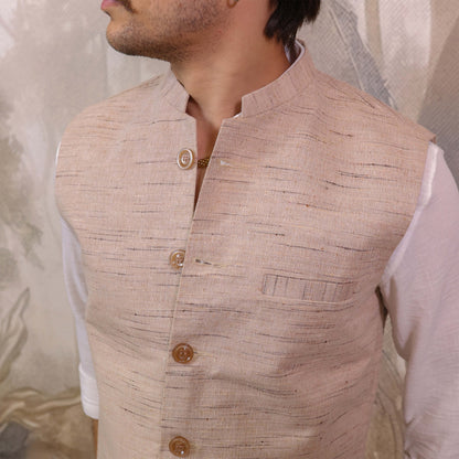 Skin Tone Cotton Bhagalpur Nehru Jacket for Men with Mandarin collar and textured woven fabric close-up.