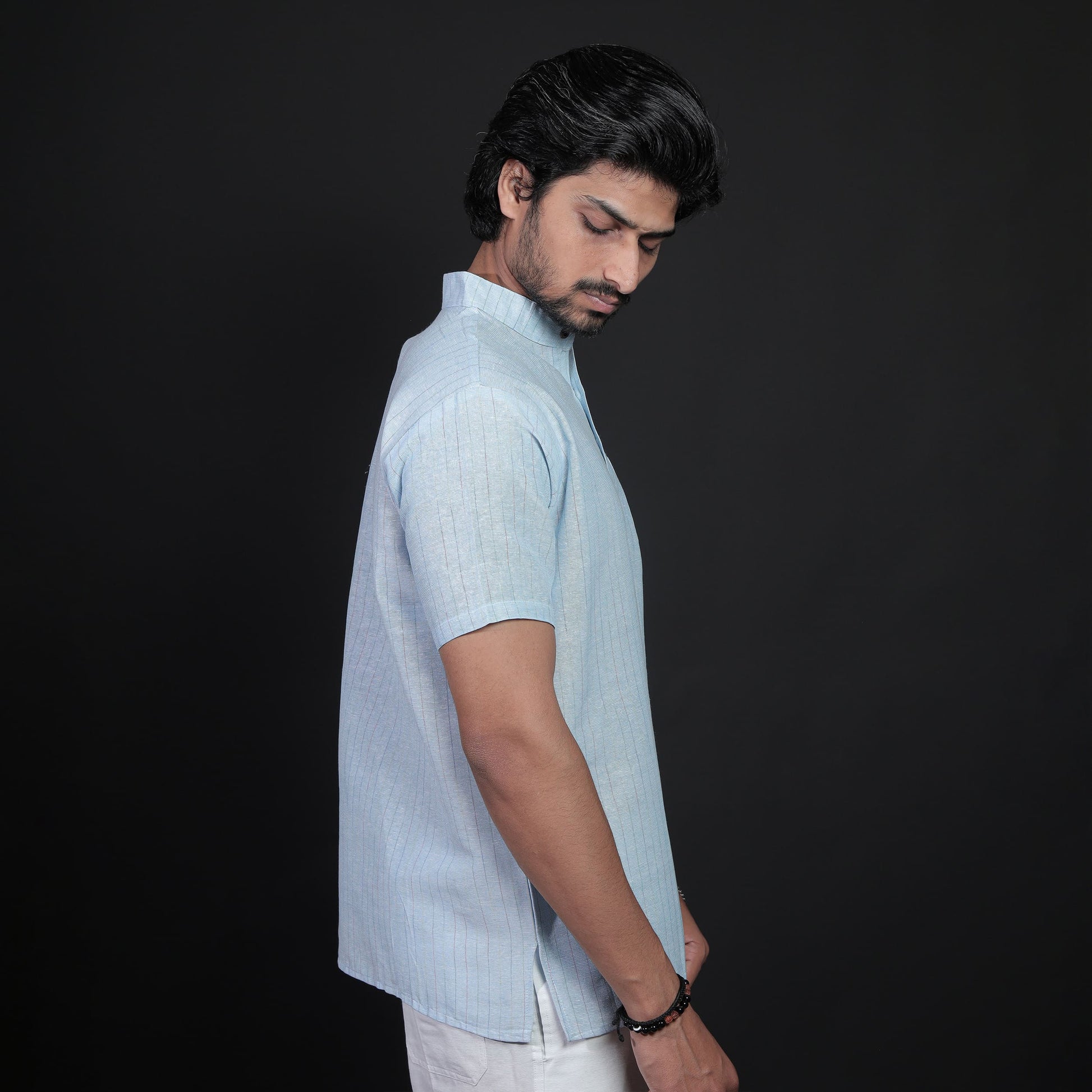Side view of blue softline half sleeves khadi cotton kurta for men