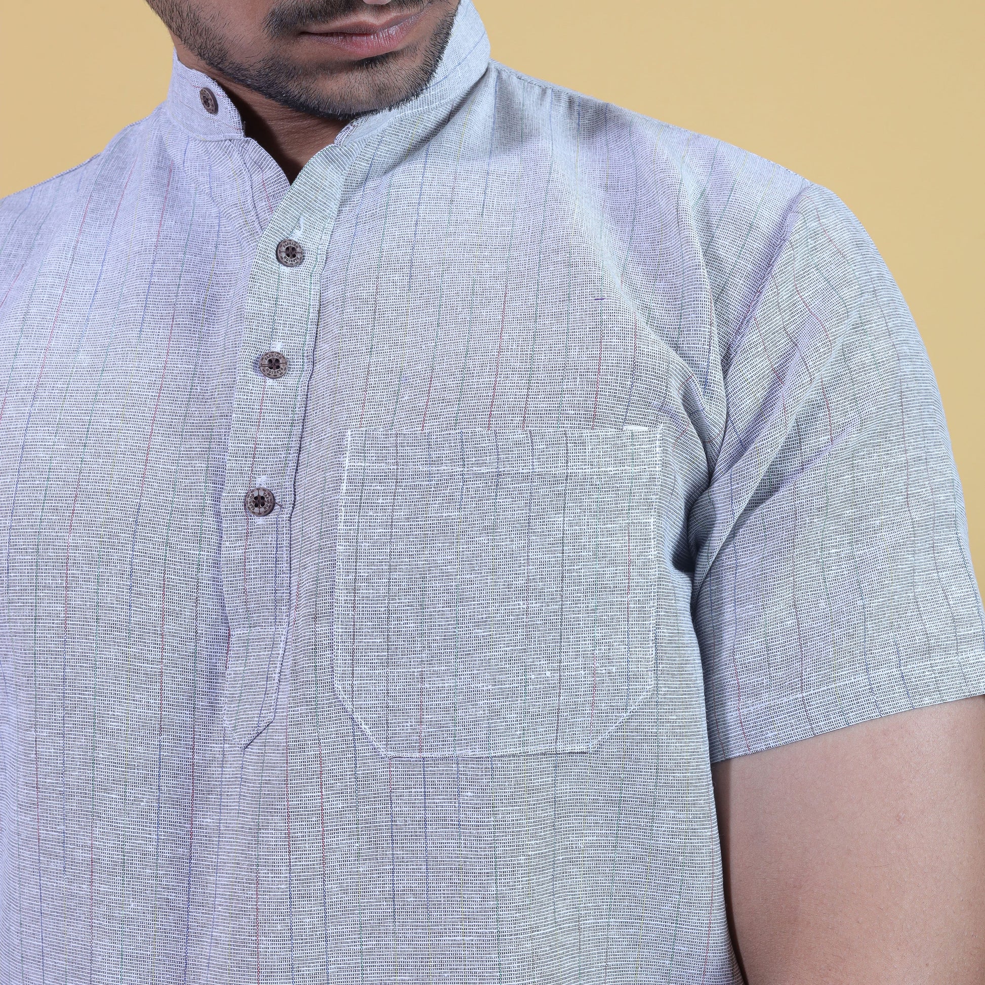 Close-up of grey striped khadi-inspired half sleeves kurta for men