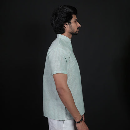 Side profile of green half sleeves ethnic kurta for men