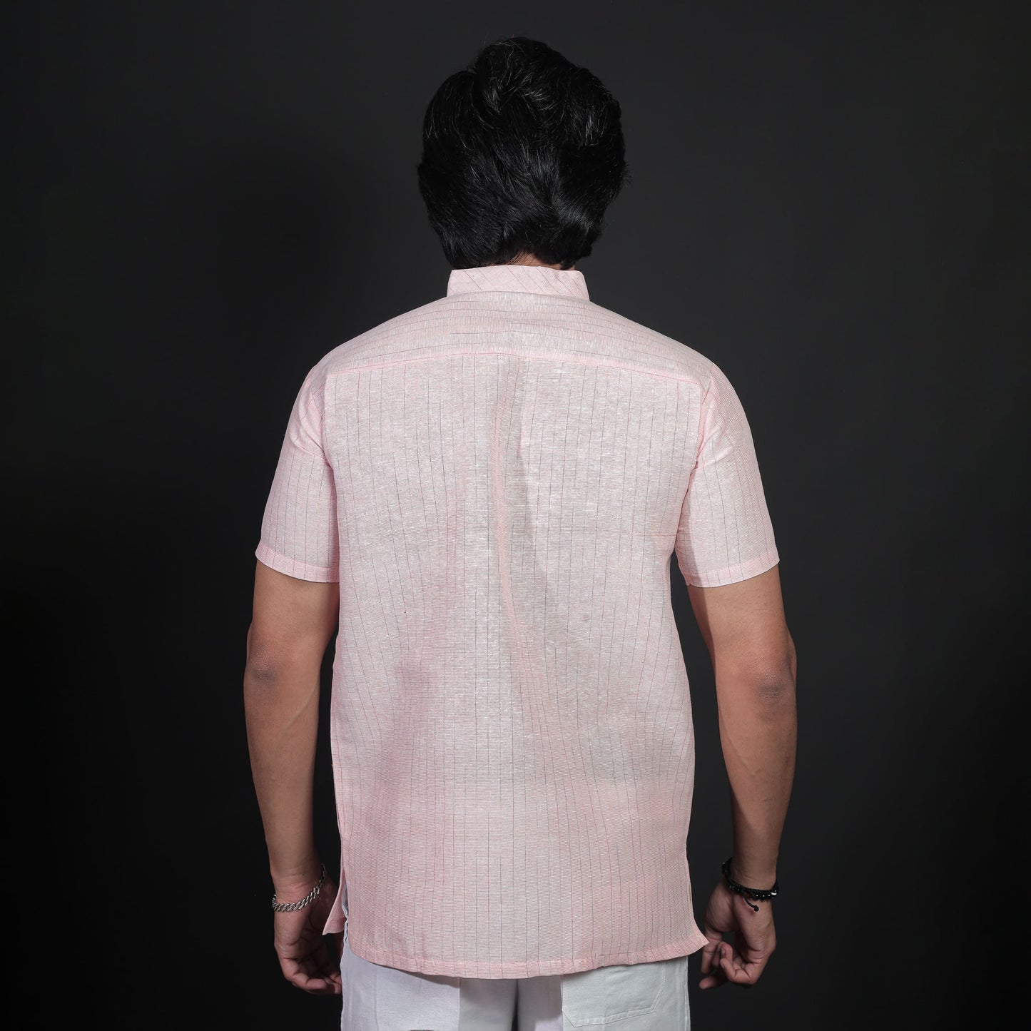 Back view of orange striped khadi-style kurta for men