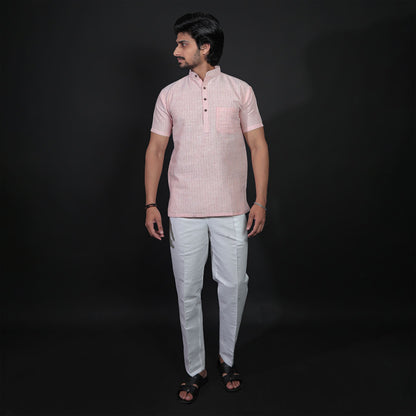 Full orange kurta and white pant combo outfit for men