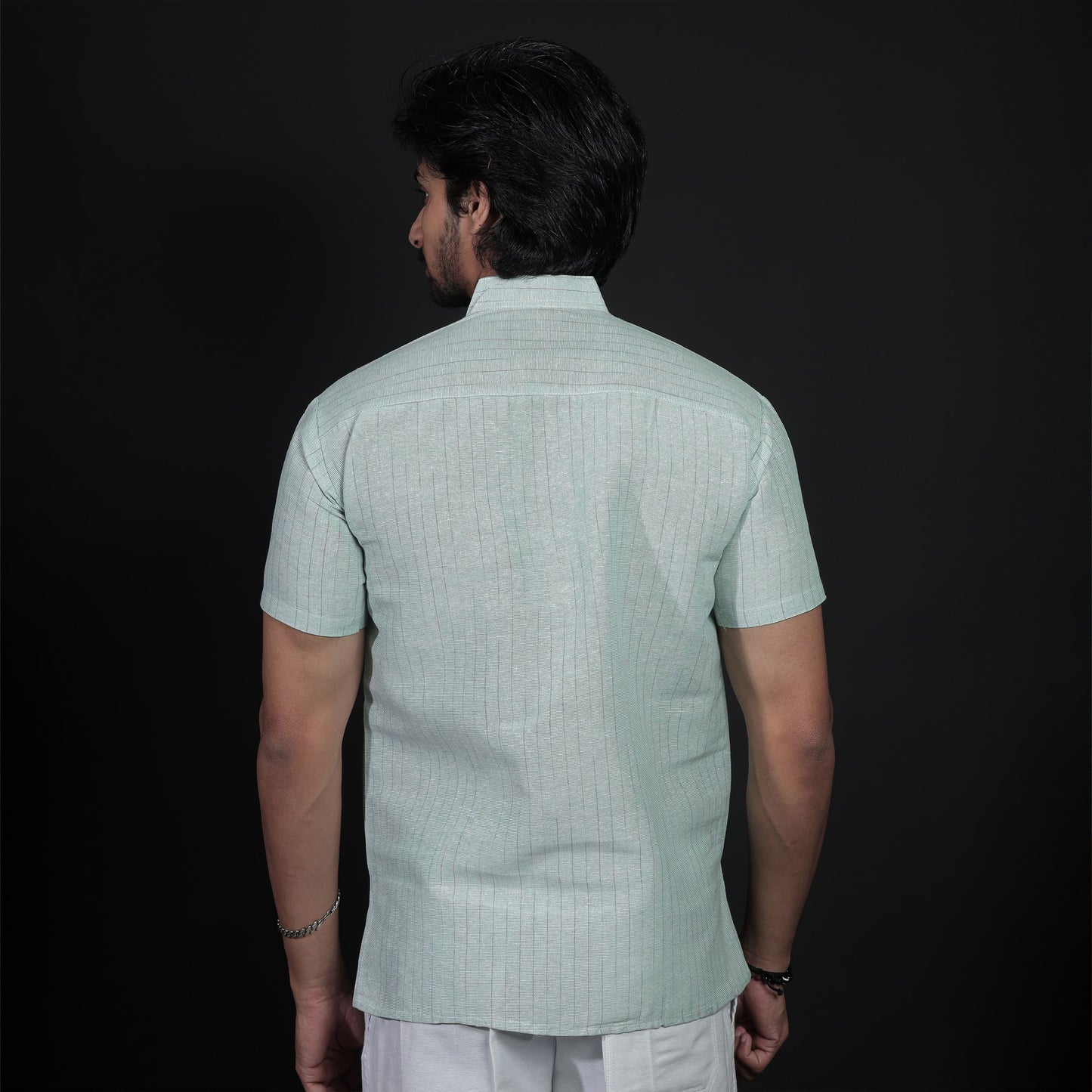 back view sage green khadi kurta clean structured design