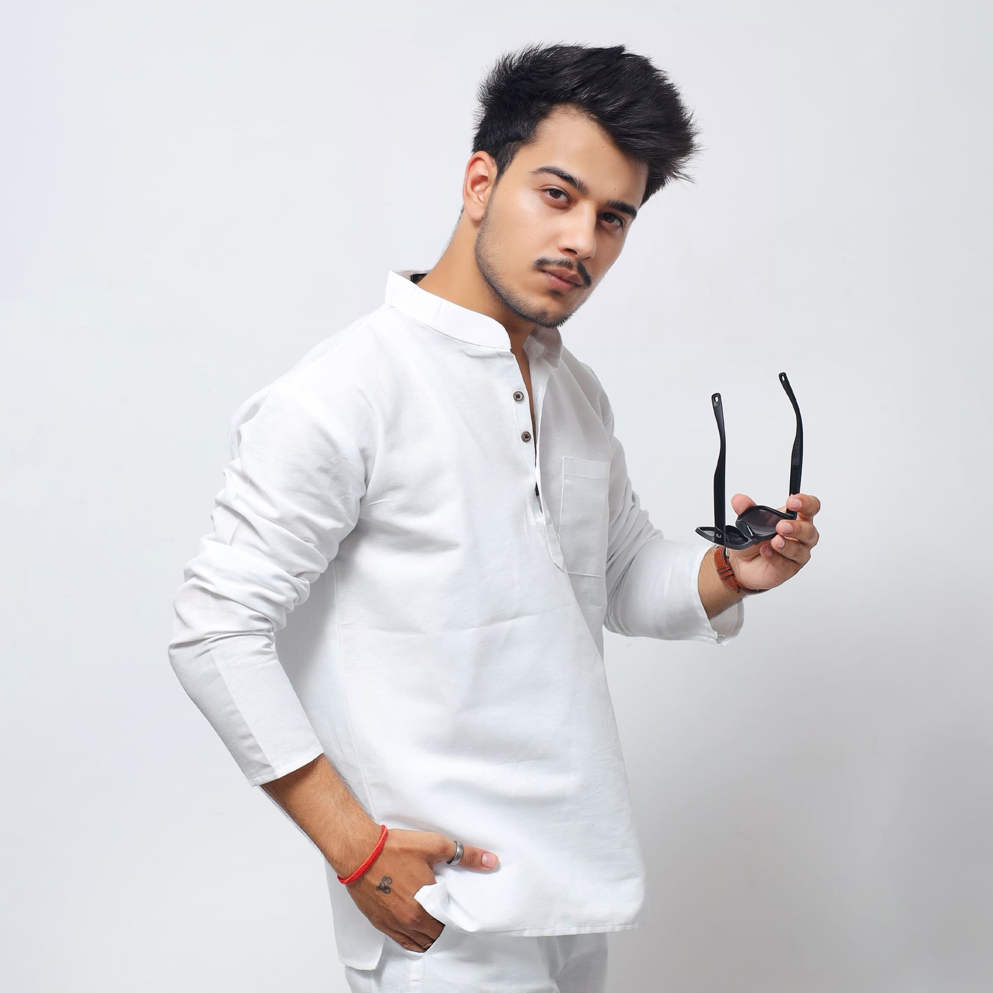 White Solid Full Sleeves Khadi Cotton Short Kurta side pose highlighting sleeve fit and silhouette