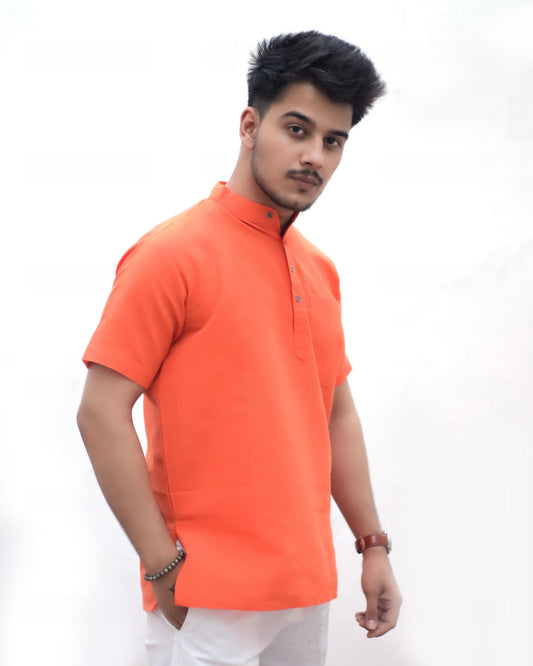 Orange solid khadi short kurta angled pose men