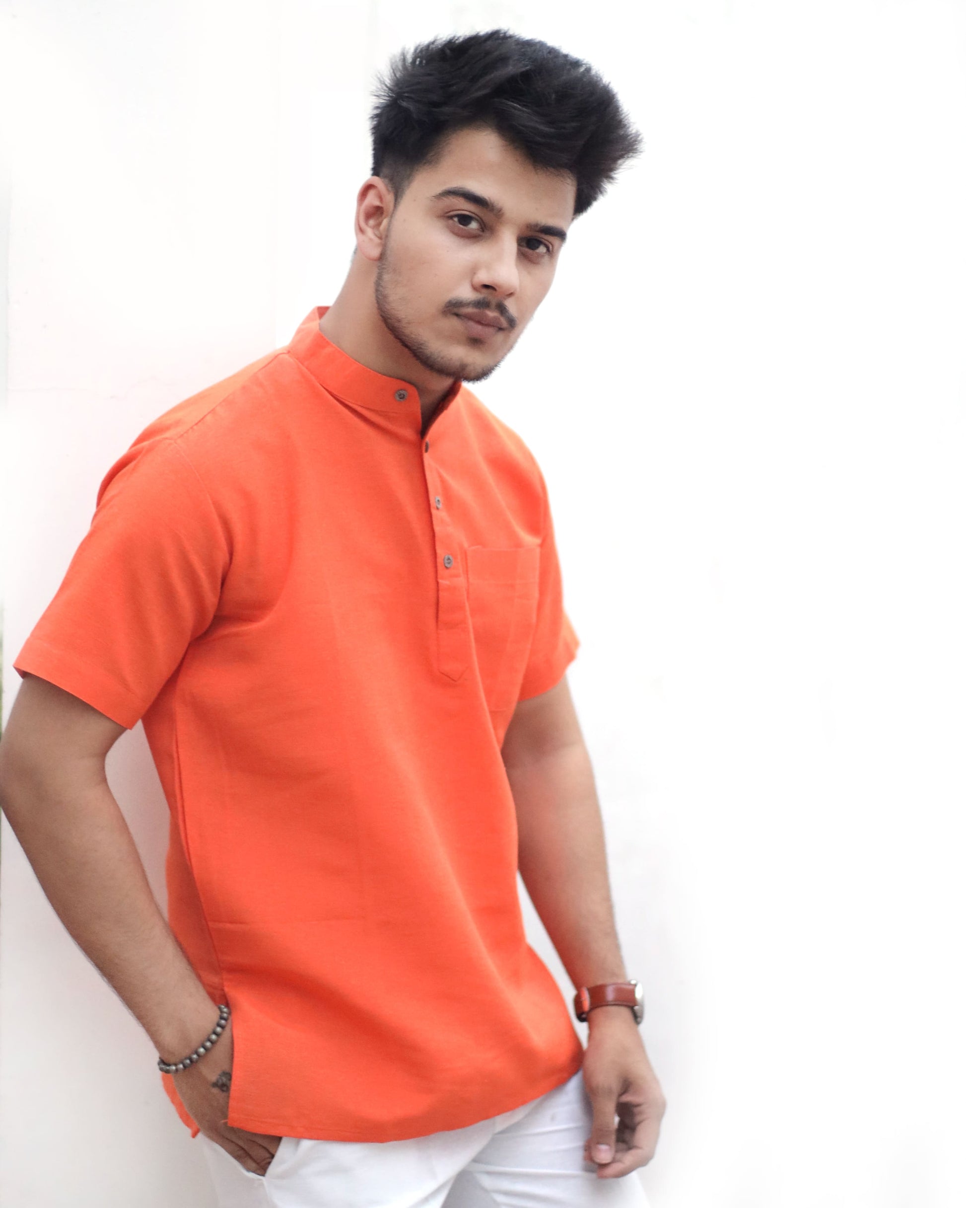 Side view orange half sleeves khadi cotton short kurta